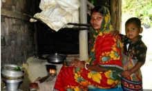 Mrs Beauty Das is using improved cooking stove 