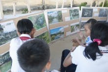 Students attending an exhibition on water pollution
