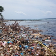 Dump site of a typical Maldivian island. Waste is dumped near the beach, polluting waterways.