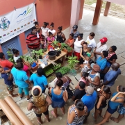 CBO members receive training in rainwater harvesting, home gardening, composting and food processing. 