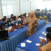 Indra Kertati leads a session for children on gender perspectives at Wonigiri Regency  