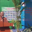 Buddhist Monk giving speech on nature conservation