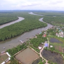 Aerial shot of shrimp ponds in the mangroves