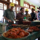 Having Lunch after planting mangrove with community at LGF site