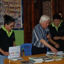 Presenting books on environment and mangroves to Phu Thoi Pagoda