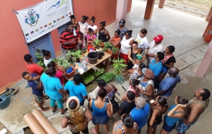 CBO members receive training in rainwater harvesting, home gardening, composting and food processing. 