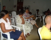 Community member in Takamaka district discusses development impacts in a meeting organised ny the Large project grantees 29052012