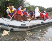 WideClean up action by school studentts facilitated by JGM at Jakarta project site2IndonesiaJGM2