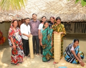 Sundarban women turned entrepreneurs by selling reed mats pose for a picture in Shyamnagar, Bangladesh. 