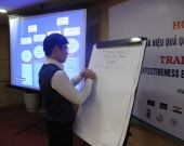 A participant presenting the group discussion's results