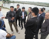 Discussing with extensive mangroves based shrimp farmers