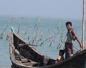 A young fisherman at the Sonadia Island