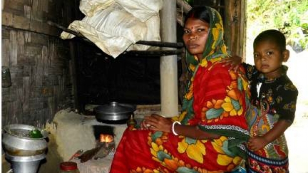 Mrs Beauty Das is using improved cooking stove 