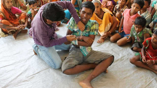 Children demonstrate basic first aid techniques for use in disaster situations