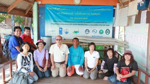 Project facility boat service dock with SGF grantee and UNDP management team 