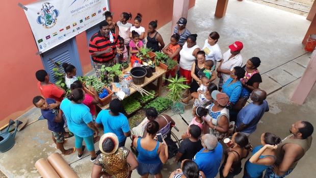 CBO members receive training in rainwater harvesting, home gardening, composting and food processing. 