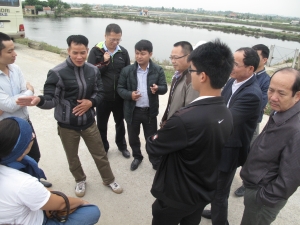 Discussing with extensive mangroves based shrimp farmers