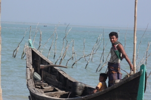 A young fisherman at the Sonadia Island